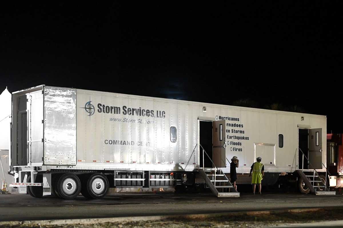 Command Center trailer deployed at a post-storm base camp.