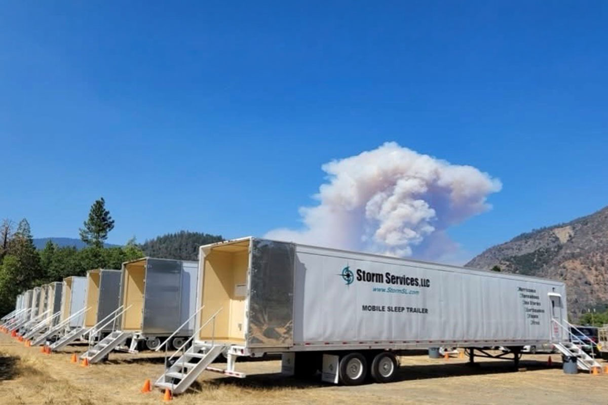 Aerial image of sleep trailers at a base camp.